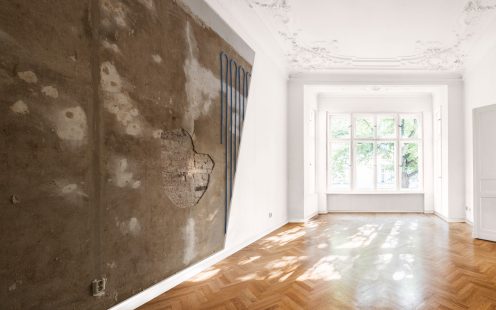 empty room in old apartment building with wooden parquet floor - real estate interior